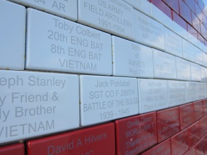 Each brick is inscribed with a tribute